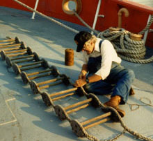 Volunteer working on LV-112's ladder